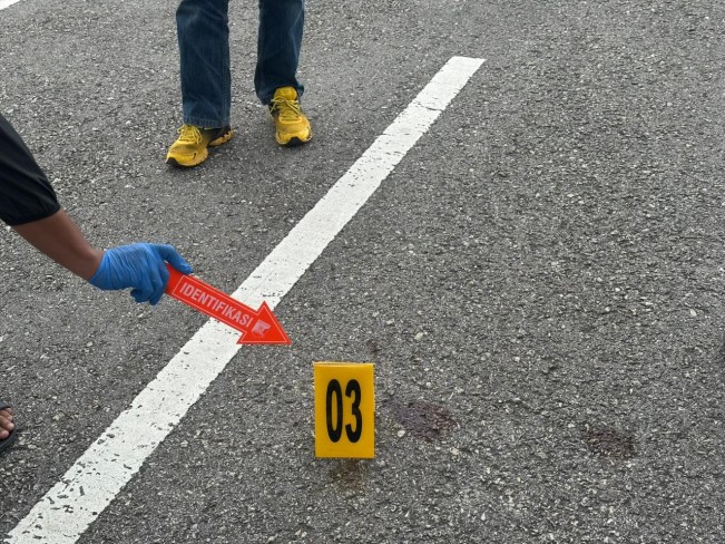 Polisi melakukan olah TKP. [Dok Polri]